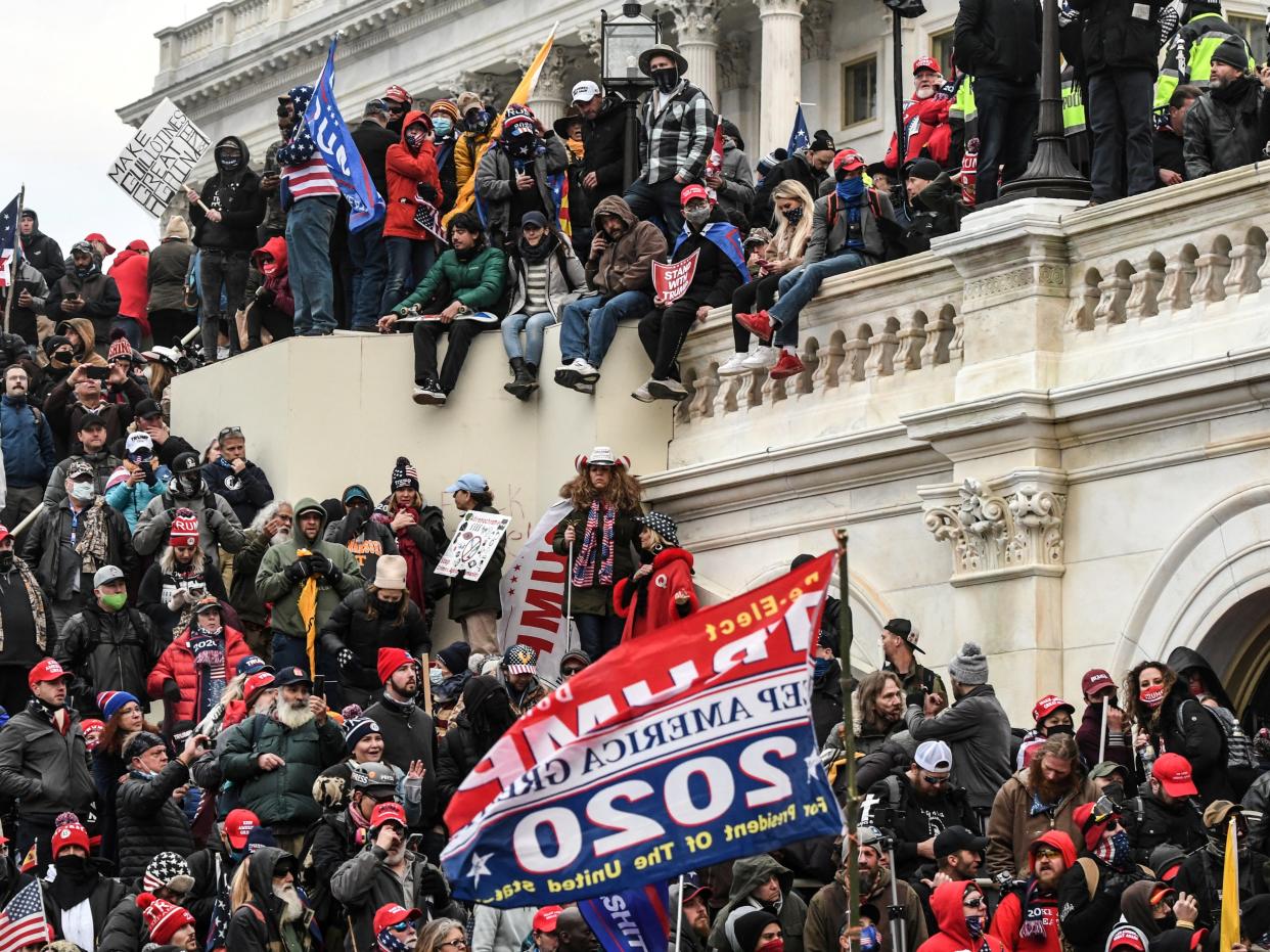 <p>Supporters of Donald Trump gather at the west entrance of the Capitol during a “Stop the Steal” protest outside of the Capitol building in Washington DC on 6 January 2021</p> ((Reuters))