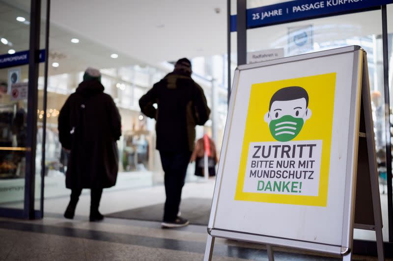 FILE PHOTO: A banner in front of the mall is seen at the Baltic Sea resort Timmendorfer Strand