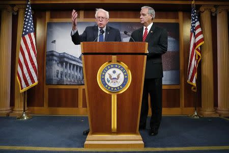 U.S. Senate Veterans' Affairs Committee Chairman Bernie Sanders (I-VT) (L) and House Veterans' Affairs Committee Chairman Jeff Miller (R-FL) announce bipartisan legislation to address problems in the VA health care system, at the U.S. Capitol in Washington July 28, 2014. REUTERS/Jonathan Ernst