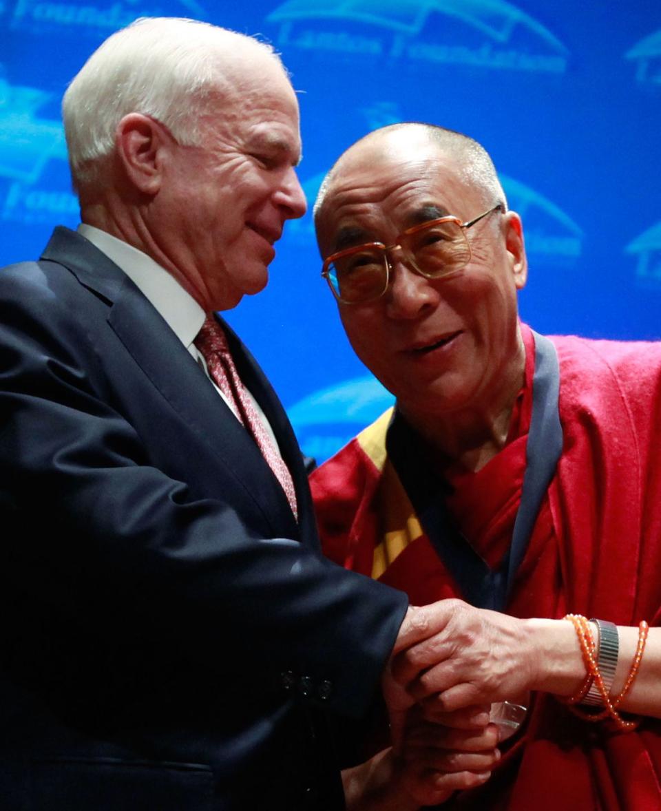 <p>The Dalai Lama greets McCain during a ceremony at the U.S. Capitol on October 6, 2009 in Washington, D.C. </p>
