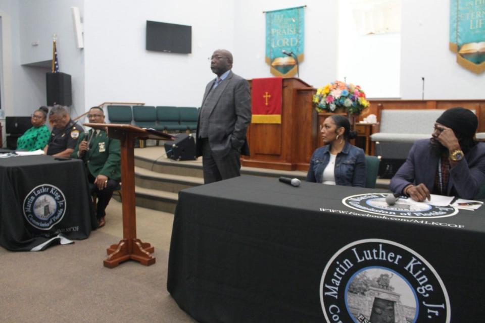 Bishop Christopher Stokes, standing, served as the moderator of the "Stop the Gun Violence" discussion at the Boys and Girls Night Out session of the 2023 Alachua County Empowerment Revival. Joining him are panelists that include, from left, Alachua County School Board member Diyonne McGraw, GPD Chief Lonnie Scott, Alachua County Sheriff Clovis Watson Jr., Cherie A. Kelly of the city of Gainesville Parks, Recreation and Cultural Affairs Department and Byron Lewis, an administrator at the Reichert House Youth Academy.
(Photo: Photo by Voleer Thomas/For The Guardian)