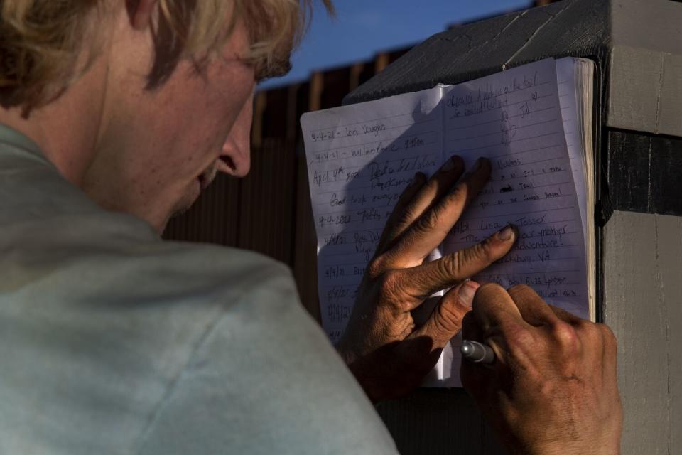 Jackson Parell signs the Pacific Crest Trail log book