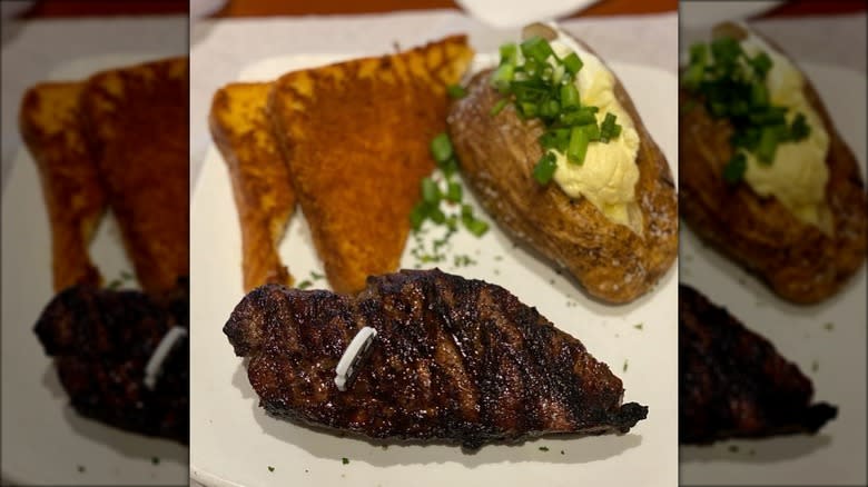 steak baked potato white plate