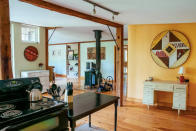 <p>The open-concept farmhouse has plenty of rustic charm with all the modern amenities, including a full kitchen.<br>(Airbnb) </p>