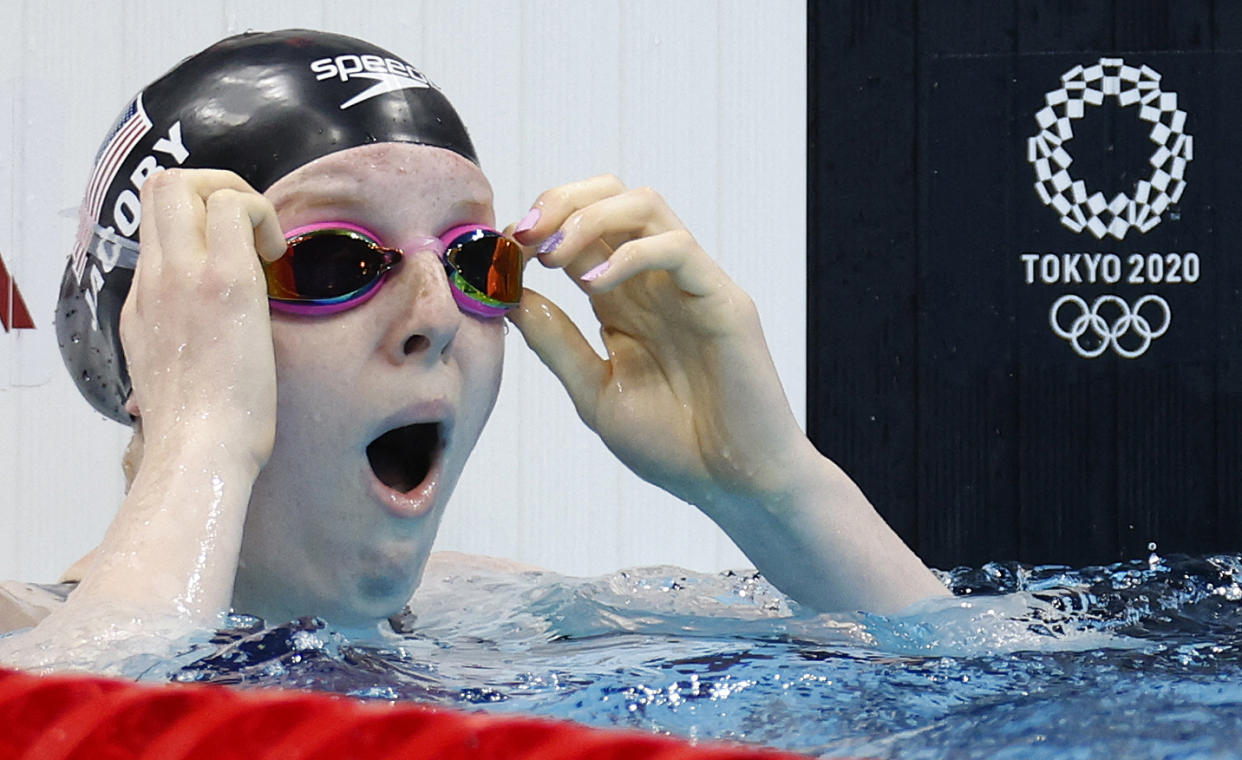 USA's Lydia Jacoby reacts after winning the final of the women's 100m breaststroke swimming event during the Tokyo 2020 Olympic Games at the Tokyo Aquatics Centre in Tokyo on July 27, 2021. (Photo by Odd ANDERSEN / AFP) (Photo by ODD ANDERSEN/AFP via Getty Images)