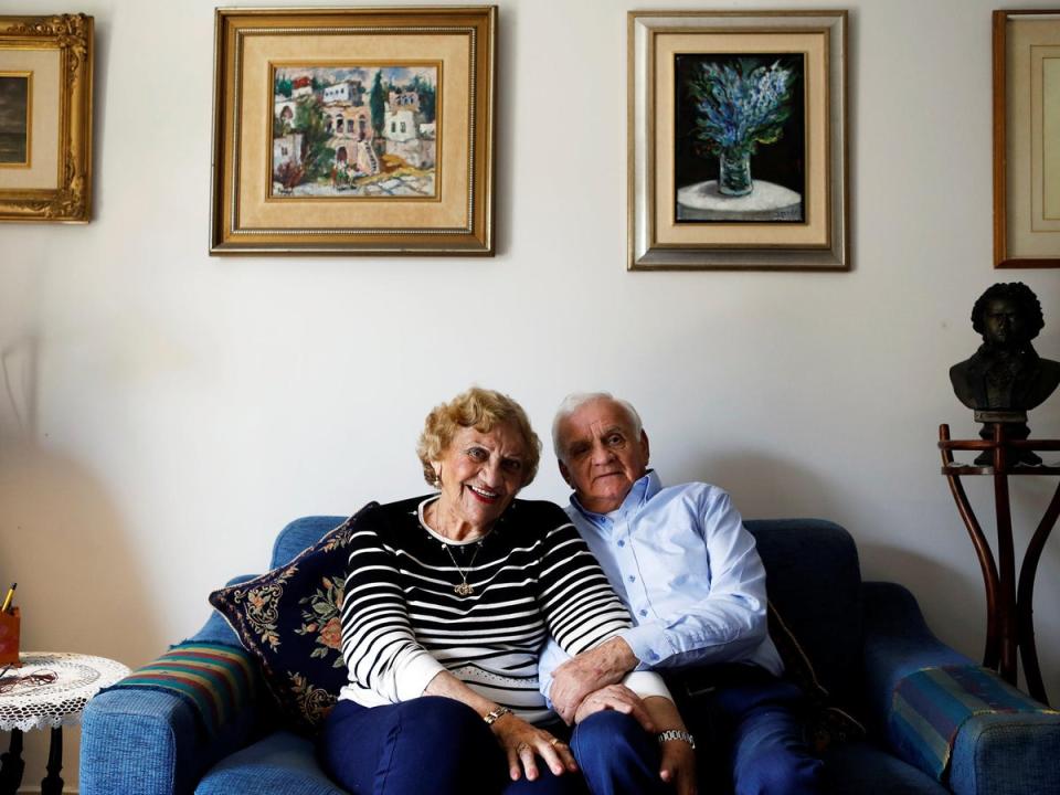 Aviva Ephrati (L), 84, retired kindergarten teacher, and Israel Ephrati, 87, retired supervisor at a higher educational institution, sit in the living room at the protective housing in Kfar Saba, north of Tel Aviv, Israel, February 8, 2018. The couple managed an art gallery in Haifa for some years. They've been married for 64 years. 