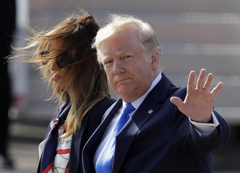 President Donald Trump waves with first lady Melania Trump as they arrive at Stansted Airport in England, Monday, June 3, 2019 at the start of a three day state visit to Britain. (Photo: Kirsty Wigglesworth/AP)