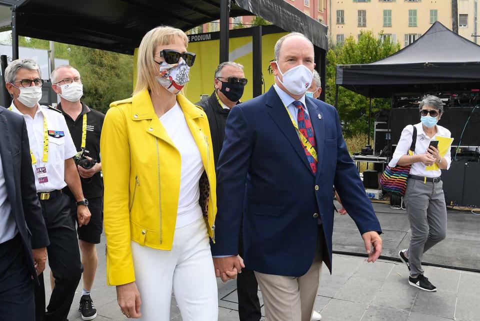 <p>Opting for the traditional winner's yellow, Charlene surprised cycling fans at the opening of last year's Tour de France. Her yellow leather jacket by Philipp Plein paired perfectly with her <a href="https://people.com/royals/princess-charlene-monaco-wears-joker-mask-why-so-serious/" rel="nofollow noopener" target="_blank" data-ylk="slk:unexpected Joker-themed mask;elm:context_link;itc:0;sec:content-canvas" class="link ">unexpected Joker-themed mask</a>.</p>