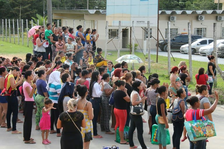 Relatives of inmates ask for information at the main gate of the Anisio Jobim Penitentiary Complex after a riot left 56 people killed in Manaus, Brazil on January 2, 2017 At least 60 people were killed in a prison riot in Brazil's Amazon region when fighting broke out between rival gangs