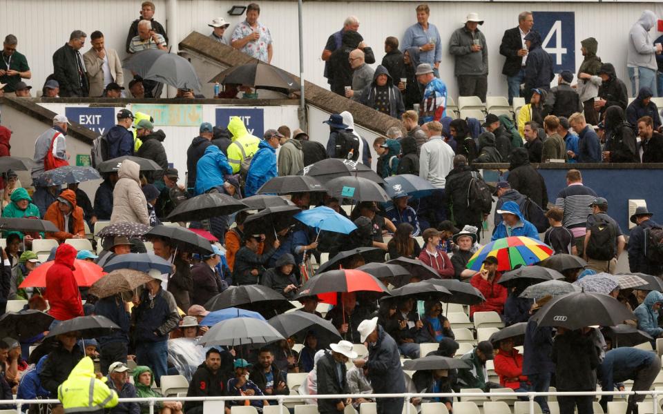 Cricket - Fifth Test - England v India - Edgbaston, Birmingham, Britain - July 1, 2022 General view of fans in the stand during a rain delay - Jason Cairnduff/Action Images via Reuters