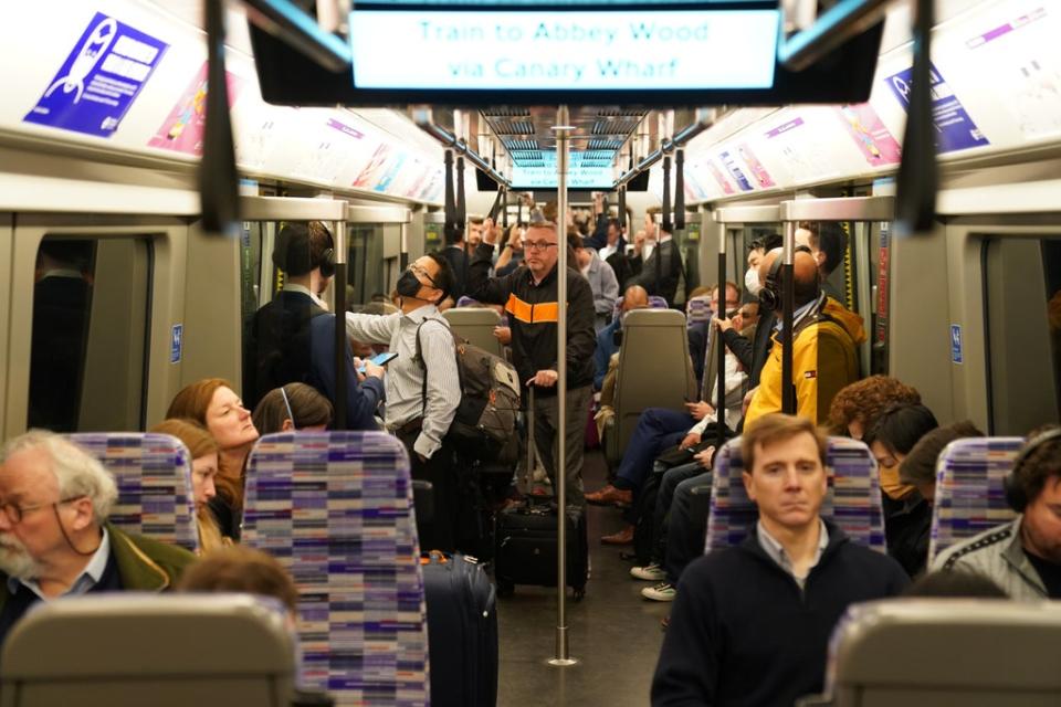 Passengers on board an Elizabeth Line train in London (Kirsty O’Connor/PA) (PA Wire)