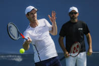Andy Murray, left, of Britain, practices as his coach Jamie Delgado, right, at the Western & Southern Open tennis tournament, Sunday, Sunday, Aug. 11, 2019, in Mason, Ohio. (AP Photo/John Minchillo)