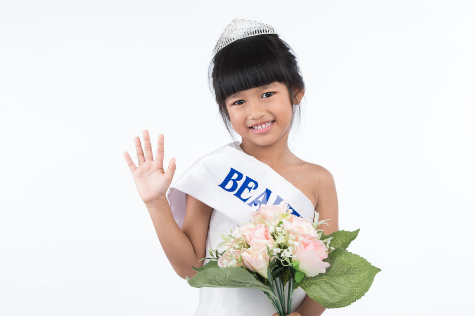 A young girl in a beauty pageant