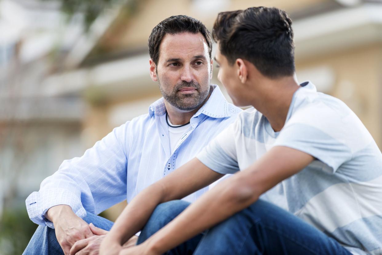 Dad listening to his son