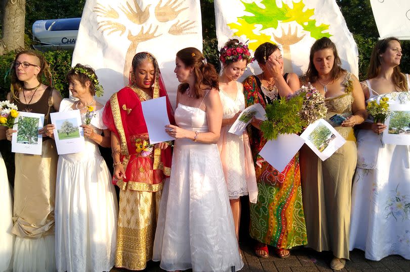 In 2021 more than 70 women 'married' dozens of trees in a ceremony to oppose plans which could see trees being removed from a prospective building site on Baltic Wharf Caravan Club Site, overlooking the Floating Harbour in Bristol -Credit:Peter Herridge / SWNS