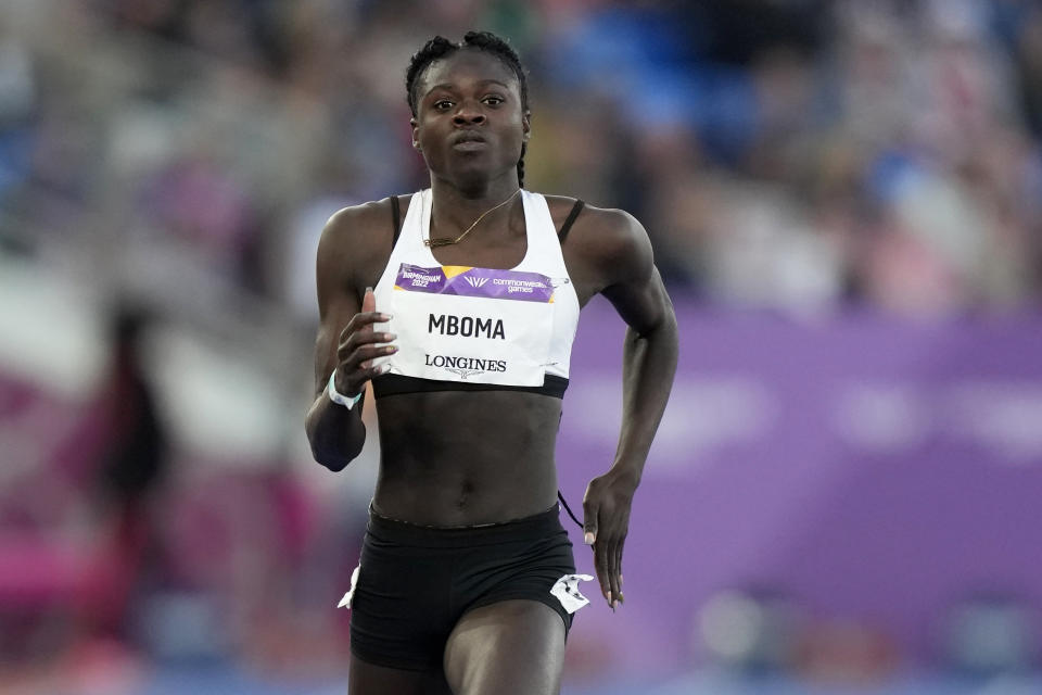 FILE - Christine Mboma of Namibia runs to win her Women's 200 meters semifinal during the athletics competition in the Alexander Stadium at the Commonwealth Games in Birmingham, England, Friday, Aug. 5, 2022. Track and field banned transgender athletes from international competition Thursday, March 23, 2023, while adopting new regulations that could keep athletes with differences in sex development from competing.Under new rules, Mboma and other athletes with differences in sex development would have to undergo hormone therapy to compete in future events. (AP Photo/Manish Swarup, File)