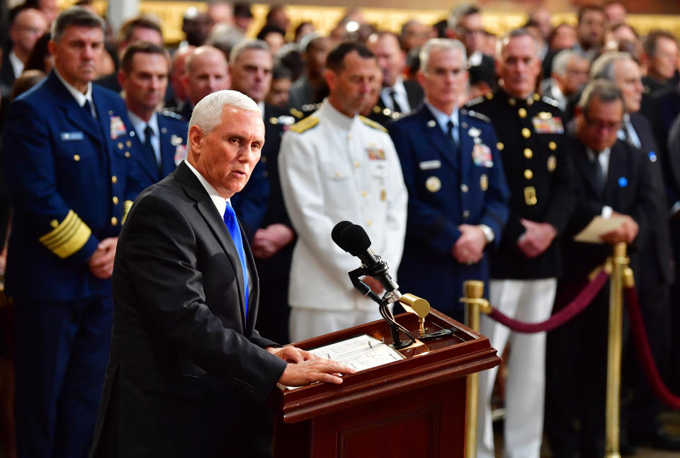 <p>Vice President Mike Pence speaks as former Senator John McCain lies in state in the Capitol Rotunda at the U.S. Capitol, in Washington, DC on Friday, Aug. 31, 2018. McCain, an Arizona Republican, presidential candidate and war hero died August 25th at the age of 81. (Photo: Kevin Dietsch – Pool/Getty Images) </p>