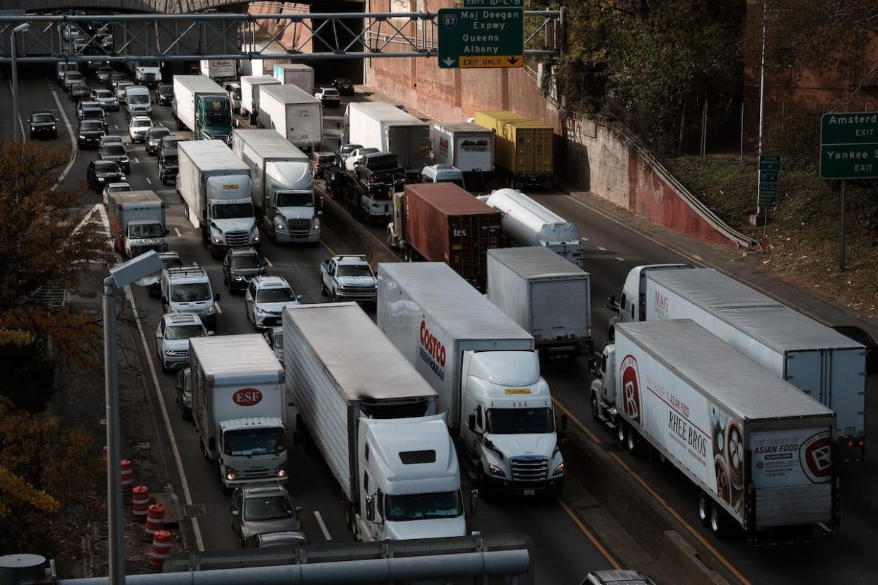 Cars and trucks move along the Cross Bronx Expressway, a notorious stretch of highway in New York City that is often choked with traffic and contributes to pollution and poor air quality on November 16, 2021 in New York City.