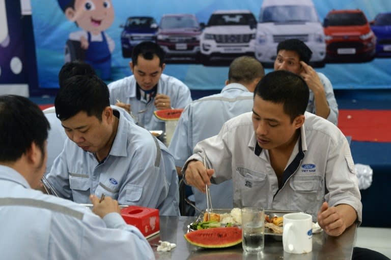 Workers at Ford's factory in Hai Duong, Vietnam, can earn more than twice the country's average annual income of $2,100