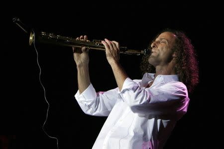 U.S. jazz musician and saxophonist Kenneth Gorelick, known as Kenny G, performs during a concert in Hong Kong as part of his "Rhythm and Romance" world tour in this May 9, 2008 file photo. REUTERS/Victor Fraile/Files