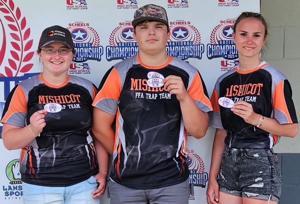 Mishicot High School trap team recently competed in the National High School trap tournament in Mason, Michigan. From left: Emma Schmidt shows her 25-straight patch that she earned, Fischer Schaus shows his two 50-straight and two 25-straight patches he earned, and Vanessa Paquette shows the two 25 patches she earned.