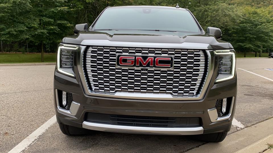 The 2021 GMC Yukon Denali's grille and lights distinguish it from other Yukon models.