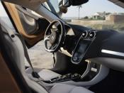 <p>The interior includes a 7.0-inch portrait-style touchscreen, inspired by those used on private jets. SiriusXM satellite radio and navigation are standard as well.</p>