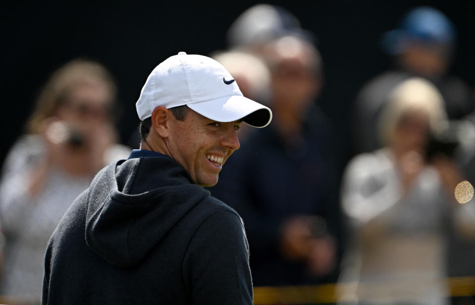 Northern Ireland’s Rory McIlroy reacts after driving from the 1st tee during a practice round for 151st British Open Golf Championship at Royal Liverpool Golf Course in Hoylake, north west England on July 17, 2023. The Royal Liverpool Golf Course will host The 151st Open from July 20 to 23, 2023. (Photo by Paul ELLIS / AFP)