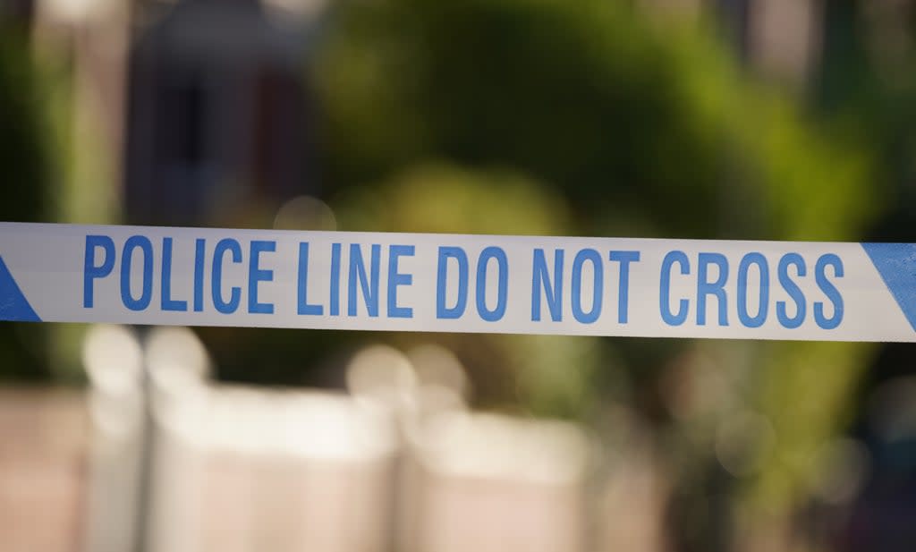 A woman has been arrested on suspicion of neglect after the boy fell from a second-storey window  (PA )