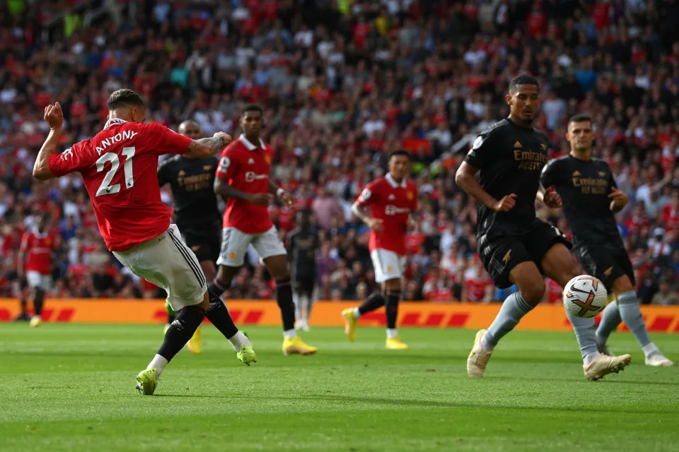 MANCHESTER, ENGLAND - SEPTEMBER 04: Antony of Manchester United scores their sides first goal during the Premier League match between Manchester United and Arsenal FC at Old Trafford on September 04, 2022 in Manchester, England. (Photo by Shaun Botterill/Getty Images)
