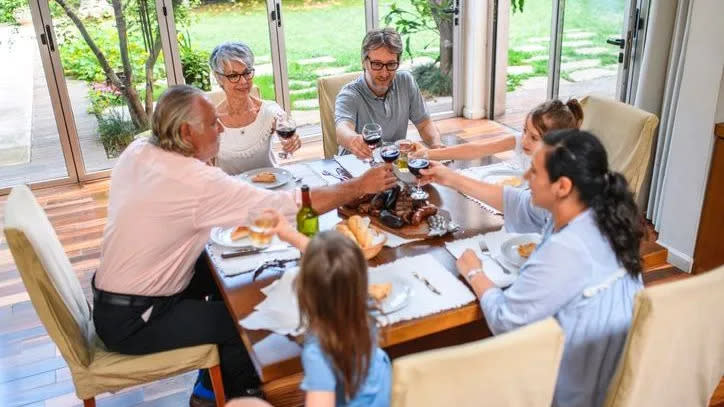 A wealthy family has dinner after making a critical decision to form a family limited partnership over a trust.