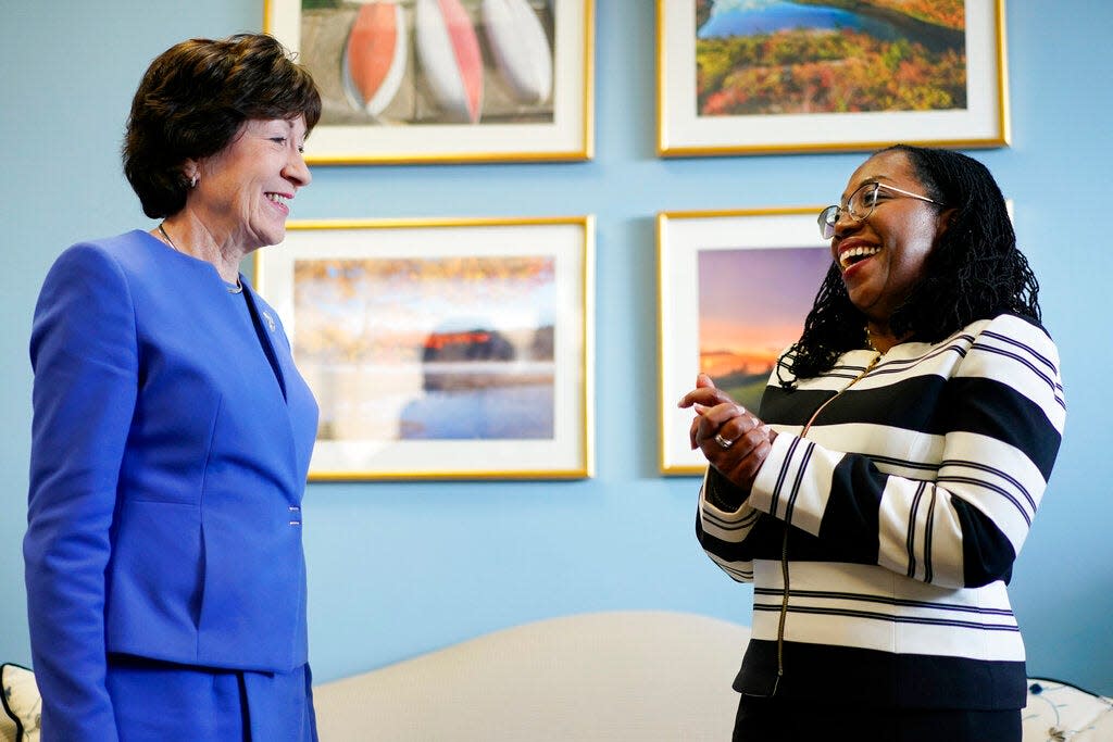 FILE - Supreme Court nominee Ketanji Brown Jackson meets with Sen. Susan Collins, R-Maine, on Capitol Hill in Washington, March 8, 2022.  Collins will vote to confirm Ketanji Brown Jackson, giving Democrats at least one Republican vote and all but assuring that she will become the first Black woman on the Supreme Court. (AP Photo/Carolyn Kaster, File)