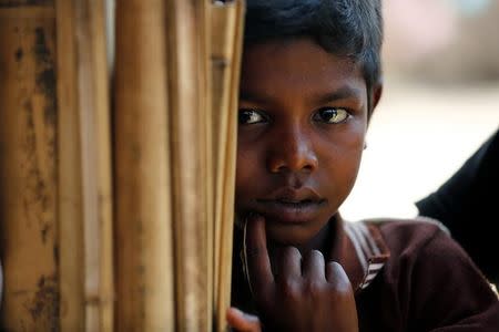 A rohingya refugee boy looks on at Balukhali Makeshift Refugee Camp in Cox's Bazar, Bangladesh April 12, 2017. REUTERS/Mohammad Ponir Hossain