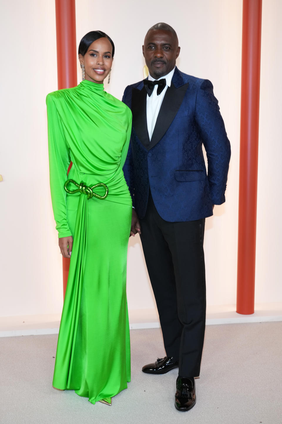 HOLLYWOOD, CALIFORNIA - MARCH 12: : (L-R) Sabrina Dhowre Elba and Idris Elba attends the 95th Annual Academy Awards on March 12, 2023 in Hollywood, California. (Photo by Kevin Mazur/Getty Images)