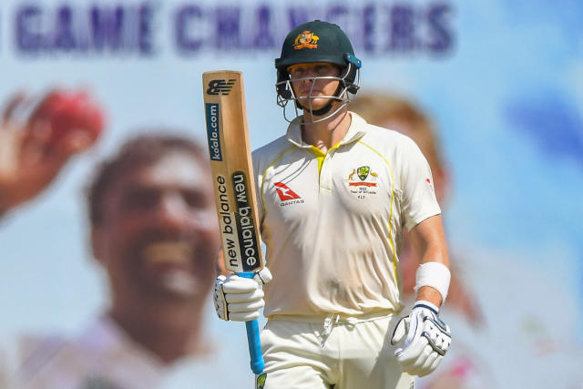 Seen here, Australia's Steve Smith raises his bat during the first day of second cricket Test against Sri Lanka in Galle. 