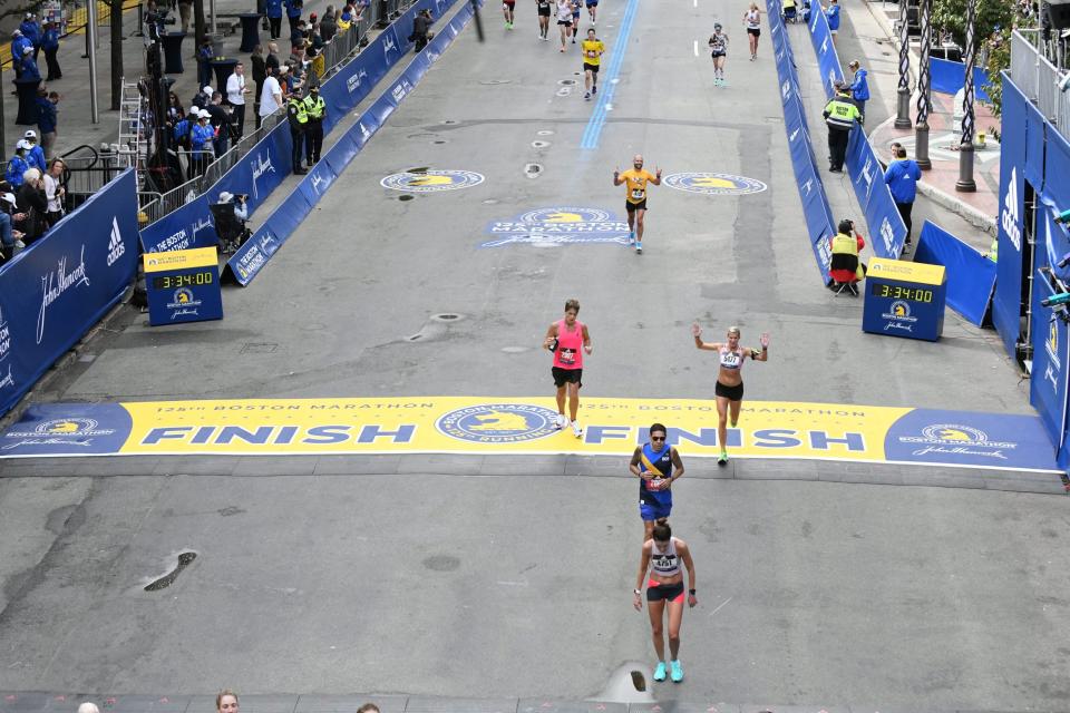 Justin Rollins running in the Boston Marathon.