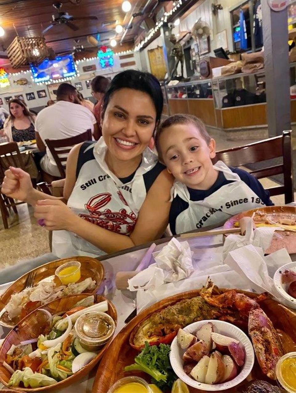 Brunna Martins, a nurse in the neonatal intensive care unit at Broward General, and her 5-year-old son, Odin.