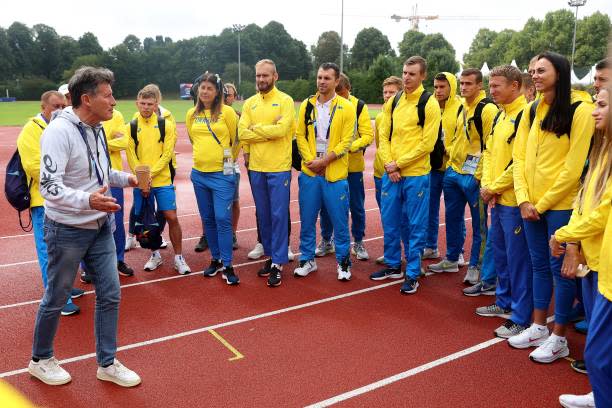File: Sebastian Coe, World Athletics president speaks with Athletes of Team Ukraine during the Athletics competition on day 9 of the European Championships Munich 2022 at Olympiapark on 19 August 2022 in Munich, Germany (Getty Images)