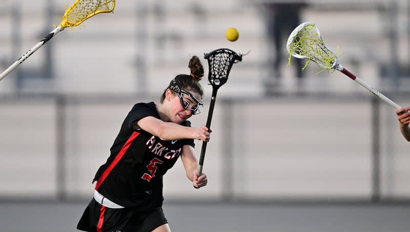 Park City’s Megan Magee shoots and scores as Park City and Skyline play a lacrosse game at Skyline on Wednesday, April 10, 2024. Park City won 22-4.