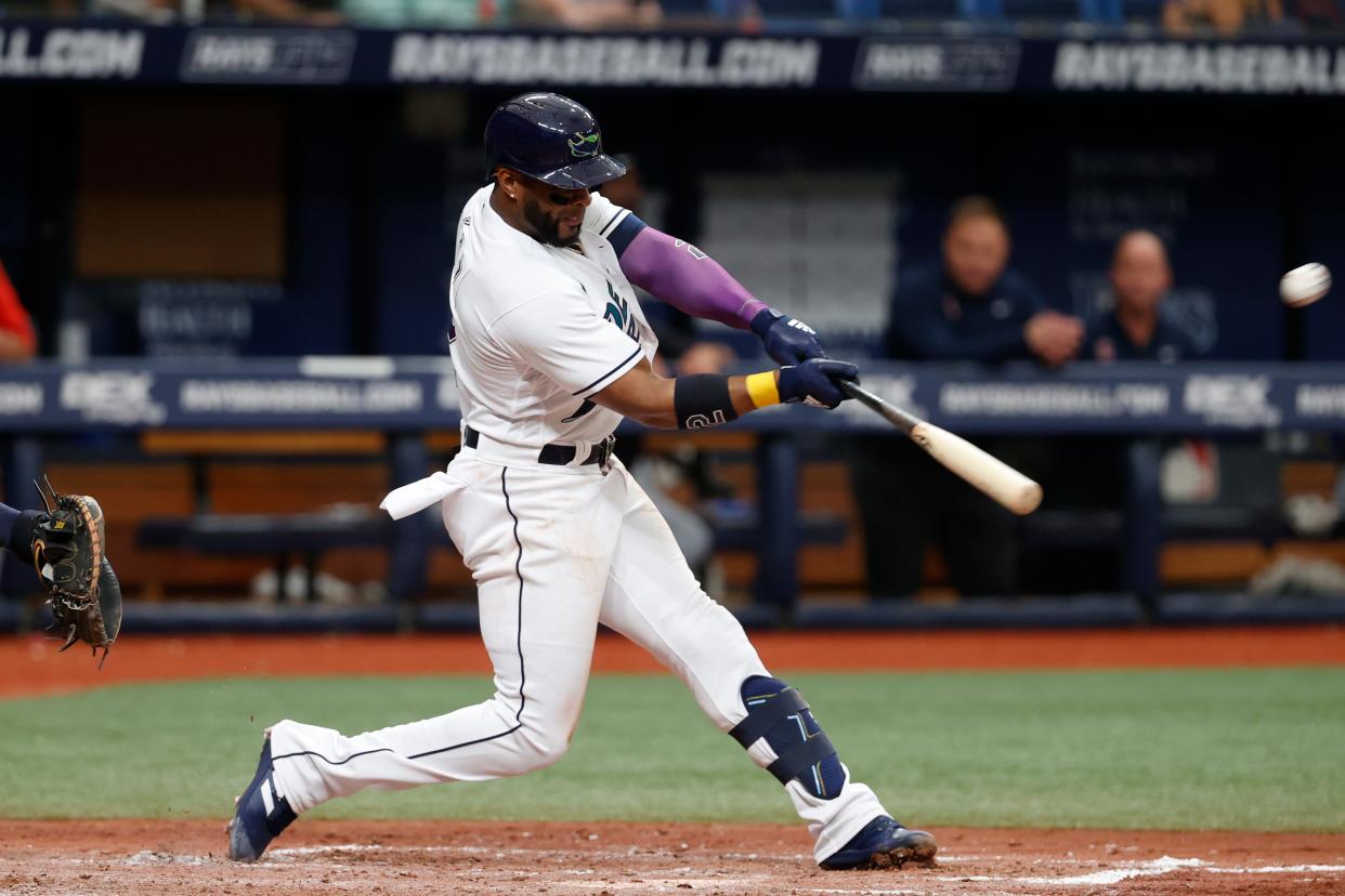 Tampa Bay Rays' Yandy Diaz hits a home run against the Guardians during the fifth inning of the Rays' 6-4 win Saturday. [Scott Audette/Associated Press]