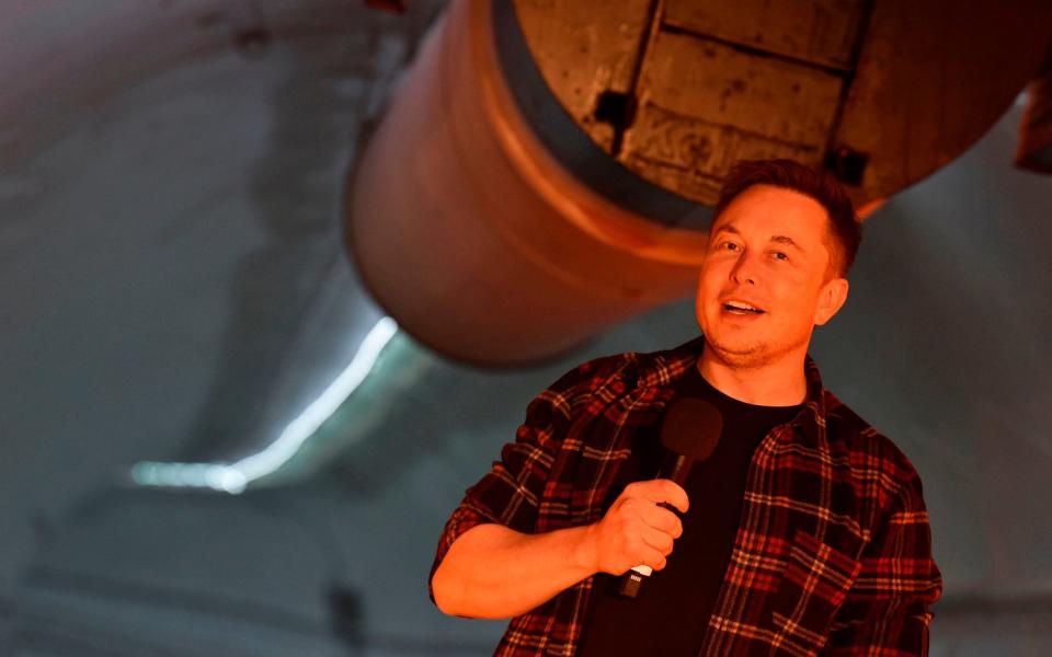 The securities regulator is asking a judge to hold Musk in contempt  - AFP