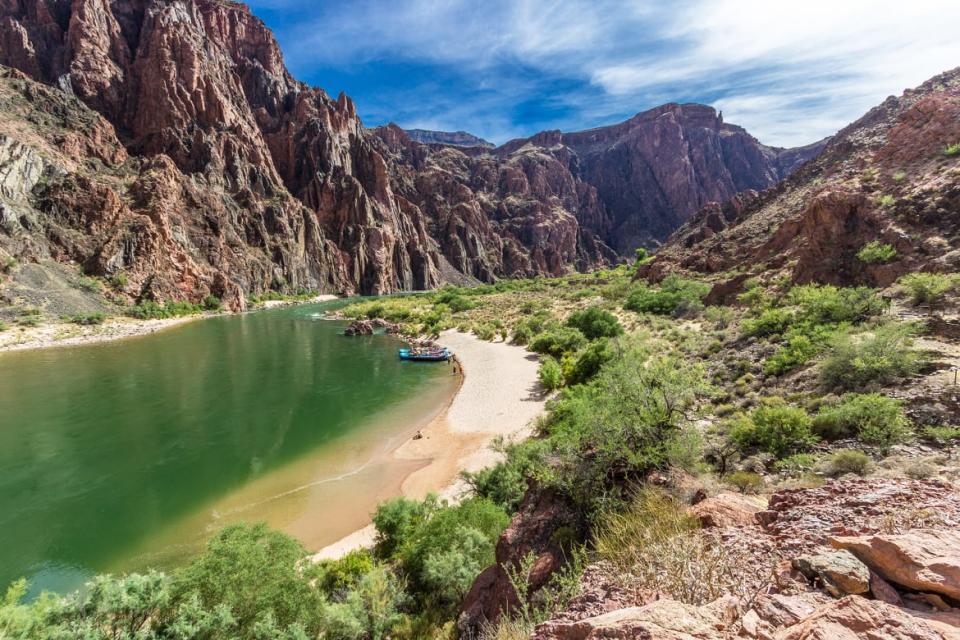 <div class="inline-image__caption"><p>Rafters on a beach on the Colorado River in the Grand Canyon at the bottom of the South Kaibab Trail.</p></div> <div class="inline-image__credit">Pete Hendley Photography/Getty</div>