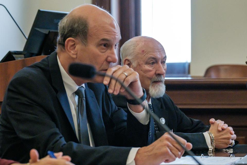 Richard P. Homrighausen, former Mayor of Dover, appears with his attorney, Jonathan Downes, during a hearing in the lawsuit brought against the city of Dover and Law Director Douglas O'Meara, Monday, July 17 in the Tuscarawas Court of Common Pleas.