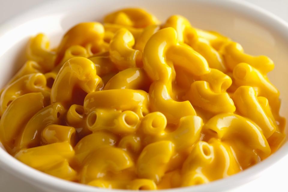 A bowl of macaroni and cheese.