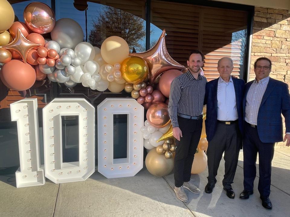 Jim's Place Grille owners Sam, Dimitri, and James Taras (left to right) at the 100th anniversary celebration on Nov. 28, 2021.