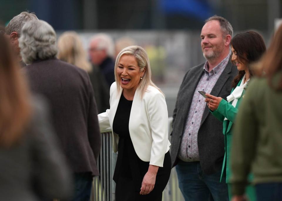 Sinn Fein’s Michelle O’Neill talks to party colleagues at Meadowbank sports arena (Niall Carson/PA) (PA Wire)