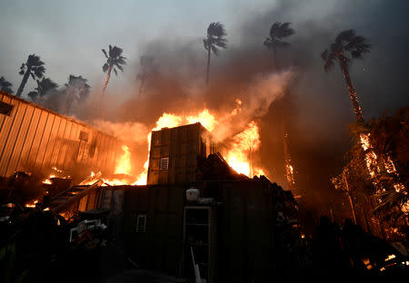 A home is engulfed in flames during the Woosley Fire in Malibu, California, U.S. November 9, 2018. REUTERS/Gene Blevins