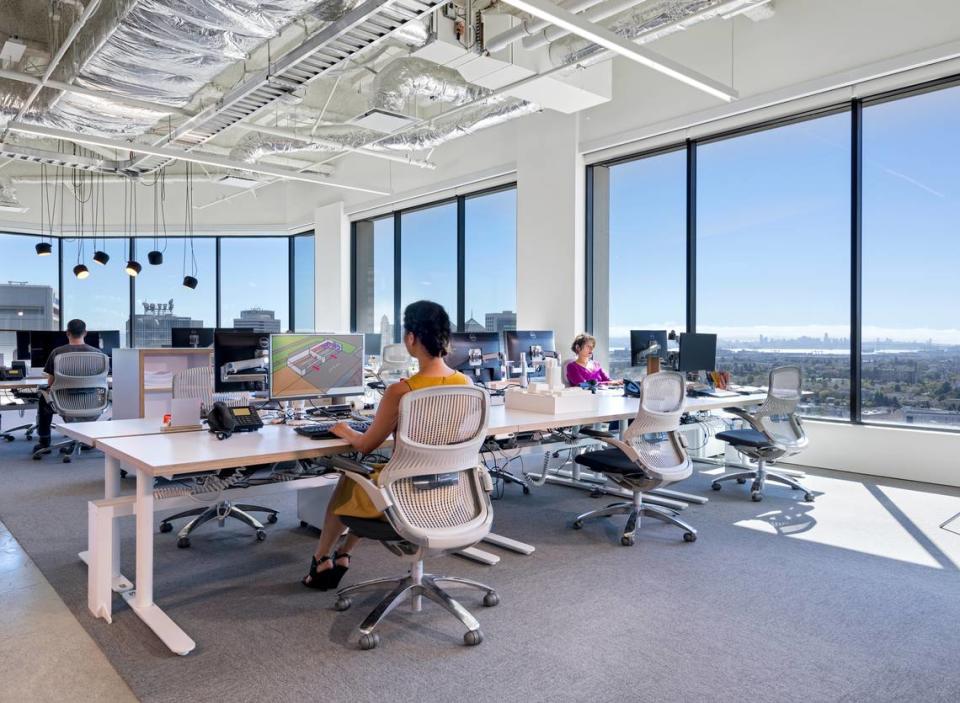 A photo of architecture and engineering firm Gensler’s office in Oakland, Calif., shows how workstation seating has been staggered and separated in response to the coronavirus pandemic as employees return to work.