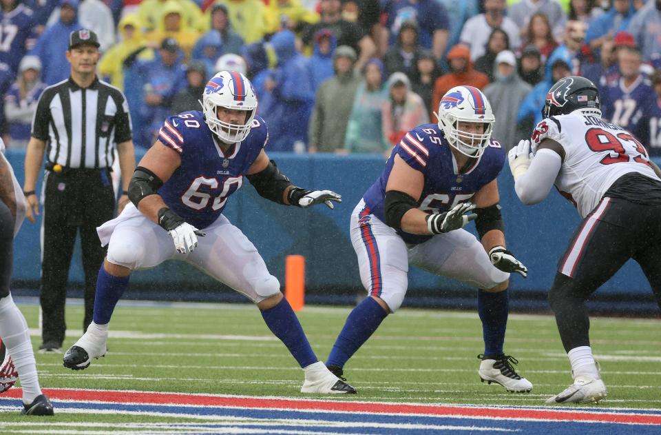 Bills offensive lineman Mitch Morse (60) and Ike Boettger drop into pass protection against Houston. 