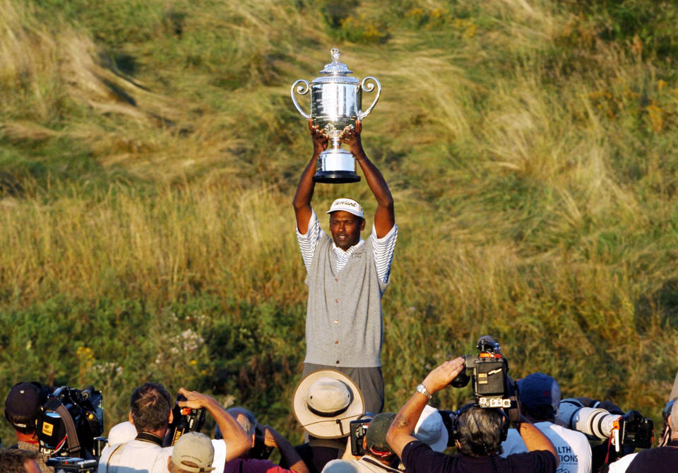 FILE - Vijay SIngh holds up the Wanamaker Trophy after winning the 86th PGA Championship at Whistling Straits in Haven, Wis., Sunday, Aug.15, 2004. Twenty years later, his final round of 76 remains the highest Sunday score of a PGA champion. (AP Photo/Jeff Roberson, File)